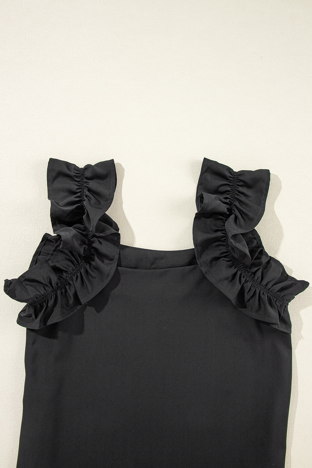 Black Solid Ruffle Trim Sleeveless Blouse